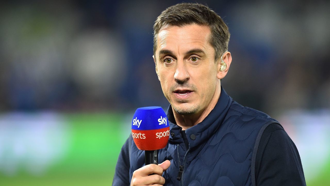 Sky Sports commentator and former footballer Gary Neville gestures before the English Premier League football match between Brighton and Hove Albion and West Ham at the American Express Community Stadium in Brighton, southern England on October 5, 2018.