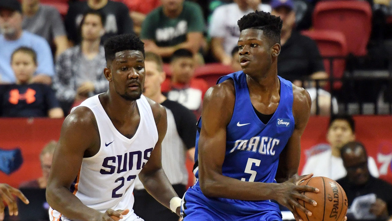 LAS VEGAS, NV - JULY 09: Mohamed Bamba #5 of the Orlando Magic is guarded by Deandre Ayton #22 of the Phoenix Suns during the 2018 NBA Summer League at the Thomas & Mack Center on July 9, 2018 in Las Vegas, Nevada. The Suns defeated the Magic 71-53.
