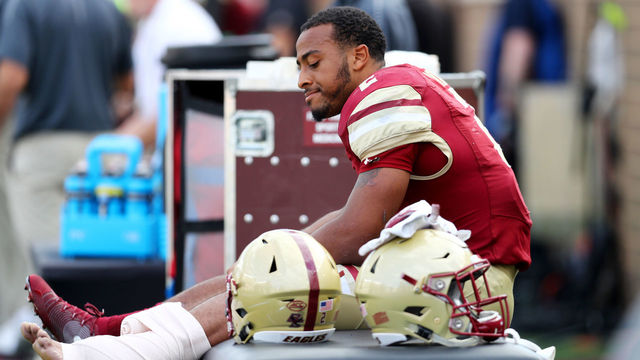 CHESTNUT HILL, MA - SEPTEMBER 29: AJ Dillon #2 of the Boston College Eagles sits on the sideline after an injury during the second half of the game between the Boston College Eagles and the Temple Owls at Alumni Stadium on September 29, 2018 in Chestnut Hill, Massachusetts.