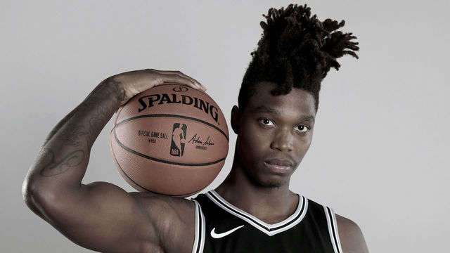 TARRYTOWN, NY - AUGUST 12: (EDITOR'S NOTE:SATURATION WAS REMOVED FROM THIS IMAGE) Lonnie Walker IV of the San Antonio Spurs poses for a portrait during the 2018 NBA Rookie Photo Shoot at MSG Training Center on August 12, 2018 in Tarrytown, New York.