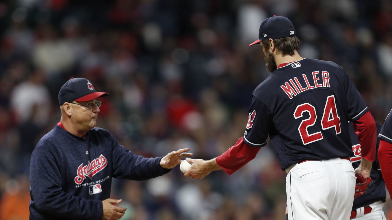 CLEVELAND, OH - SEPTEMBER 22: Manager Terry Francona #77 of the Cleveland Indians takes the ball from Andrew Miller #24 against the Boston Red Sox in the eighth inning at Progressive Field on September 22, 2018 in Cleveland, Ohio. The Indians defeated the Red Sox 5-4 in 11 innings.