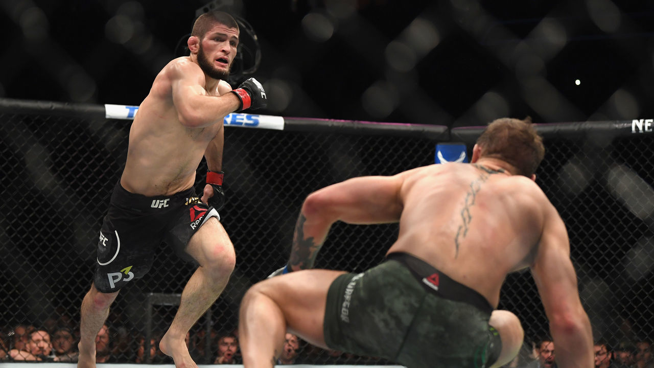 LAS VEGAS, NV - OCTOBER 06: Khabib Nurmagomedov of Russia (L) chases down Conor McGregor of Ireland in their UFC lightweight championship bout during the UFC 229 event inside T-Mobile Arena on October 6, 2018 in Las Vegas, Nevada.