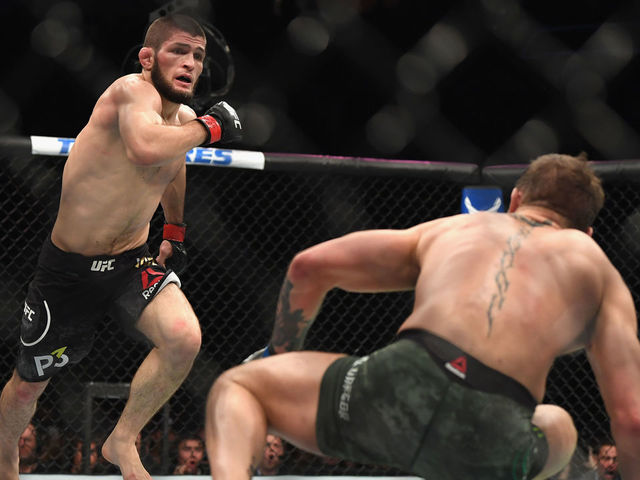 LAS VEGAS, NV - OCTOBER 06: Khabib Nurmagomedov of Russia (L) chases down Conor McGregor of Ireland in their UFC lightweight championship bout during the UFC 229 event inside T-Mobile Arena on October 6, 2018 in Las Vegas, Nevada.