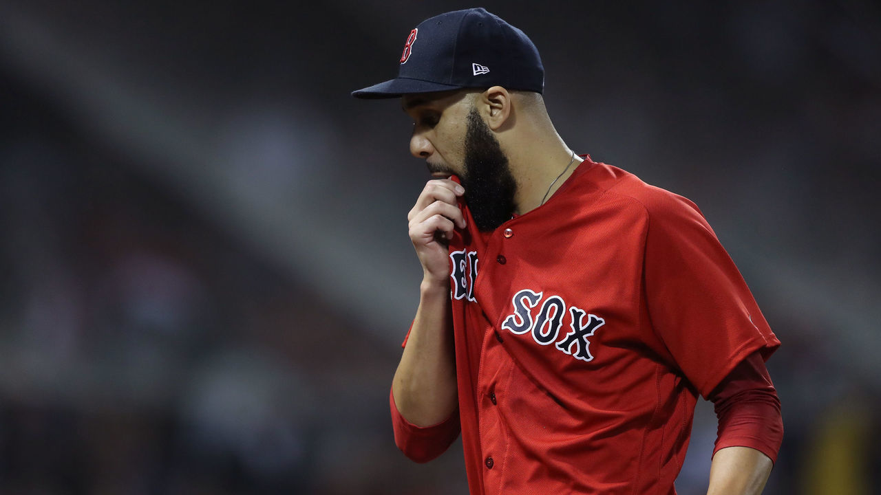 BOSTON, MA - OCTOBER 06: Pitcher David Price #24 of the Boston Red Sox wipes his mouth on his way to the dugout after being pulled from the game in the second inning of Game Two of the American League Division Series against the New York Yankees at Fenway Park on October 6, 2018 in Boston, Massachusetts.s.