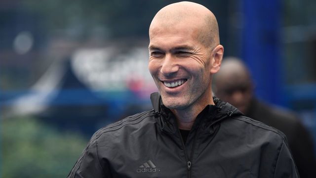TOPSHOT - Former French football player Zinedine Zidane smiles on June 11, 2018 in Saint Denis, suburban Paris, as he attends an event marking the 20th anniversary of France's 1998 World Cup victory.