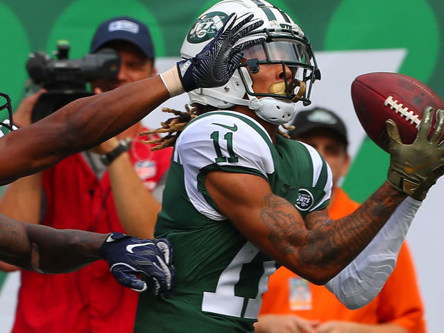 EAST RUTHERFORD, NJ - OCTOBER 07: New York Jets wide receiver Robby Anderson (11) makes a touchdown catch during the second quarter of the National Football League game between the New York Jets and the Denver Broncos on October 7, 2018 at MetLife Stadium in East Rutherford, NJ.