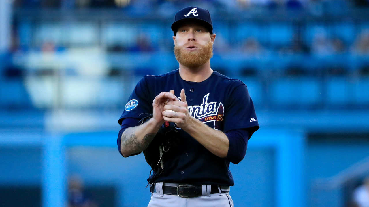 LOS ANGELES, CA - OCTOBER 04: Mike Foltynewicz #26 of the Atlanta Braves prepares to deliver the pitch against the Los Angeles Dodgers during Game One of the National League Division Series at Dodger Stadium on October 4, 2018 in Los Angeles, California.