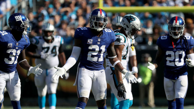 CHARLOTTE, NC - OCTOBER 07: Landon Collins #21 of the New York Giants reacts after a hit on Devin Funchess #17 of the Carolina Panthers in the fourth quarter during their game at Bank of America Stadium on October 7, 2018 in Charlotte, North Carolina.