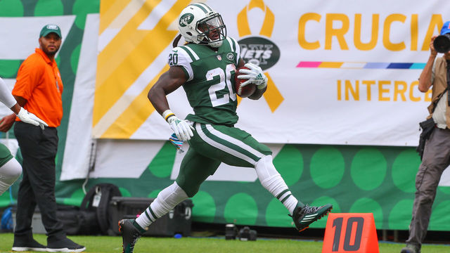 EAST RUTHERFORD, NJ - OCTOBER 07: New York Jets running back Isaiah Crowell (20) scores a touchdown on a 77 yard run during the second quarter of the National Football League game between the New York Jets and the Denver Broncos on October 7, 2018 at MetLife Stadium in East Rutherford, NJ.