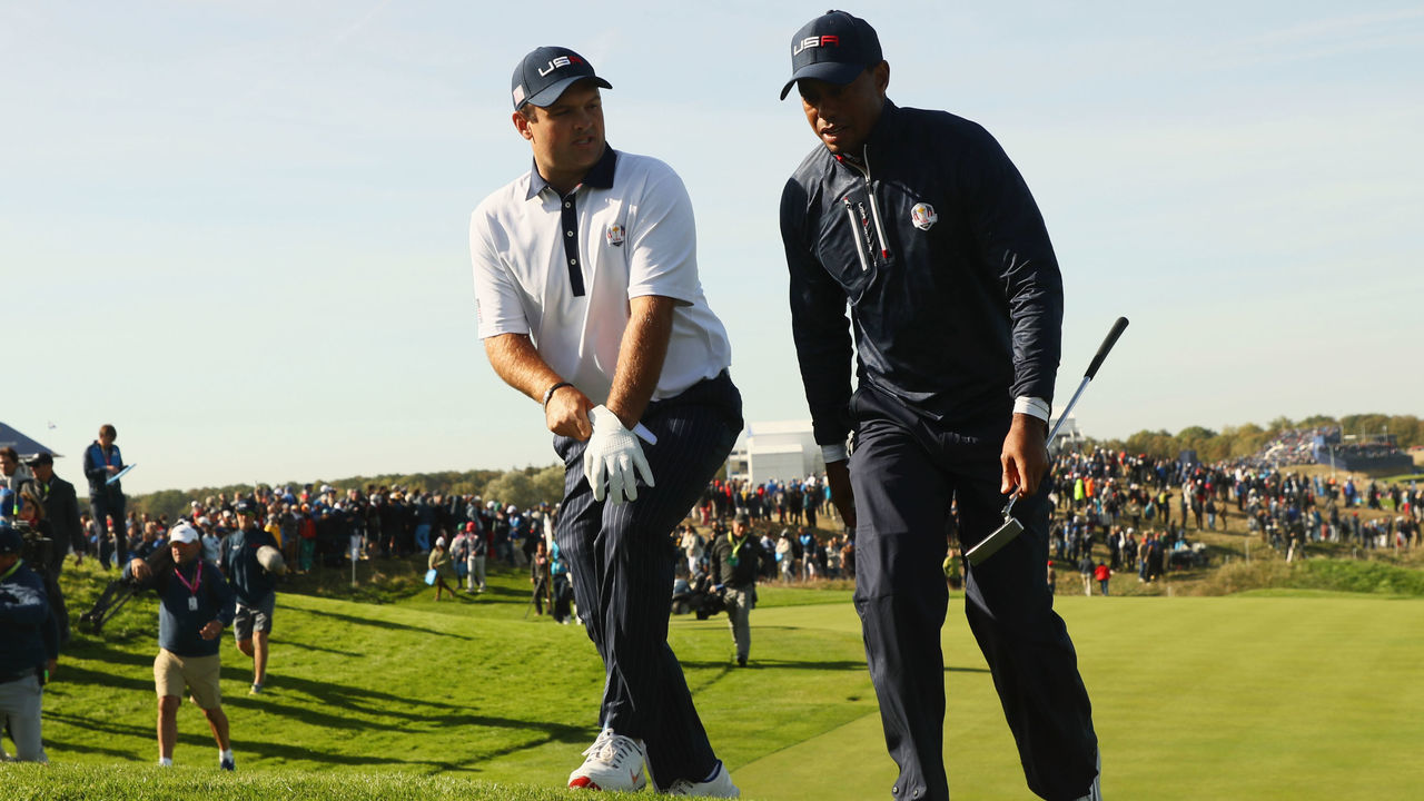 PARIS, FRANCE - SEPTEMBER 29: Tiger Woods of the United States and Patrick Reed of the United States on the 11th during the morning fourball matches of the 2018 Ryder Cup at Le Golf National on September 29, 2018 in Paris, France.