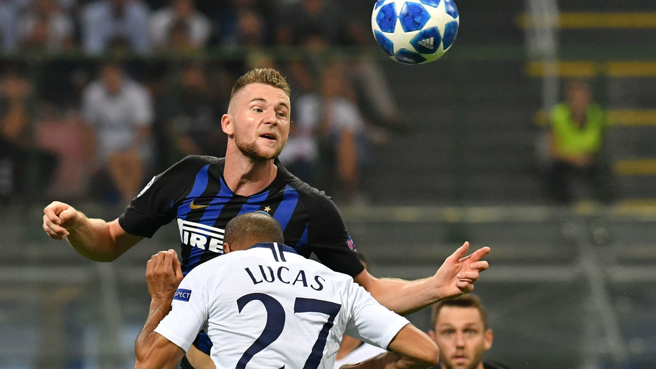 Inter Milan's Slovak defender Milan Skriniar heads the ball during the UEFA Champions League group stage football match Inter Milan vs Tottenham on September 18, 2018 at the San Siro stadium in Milan.