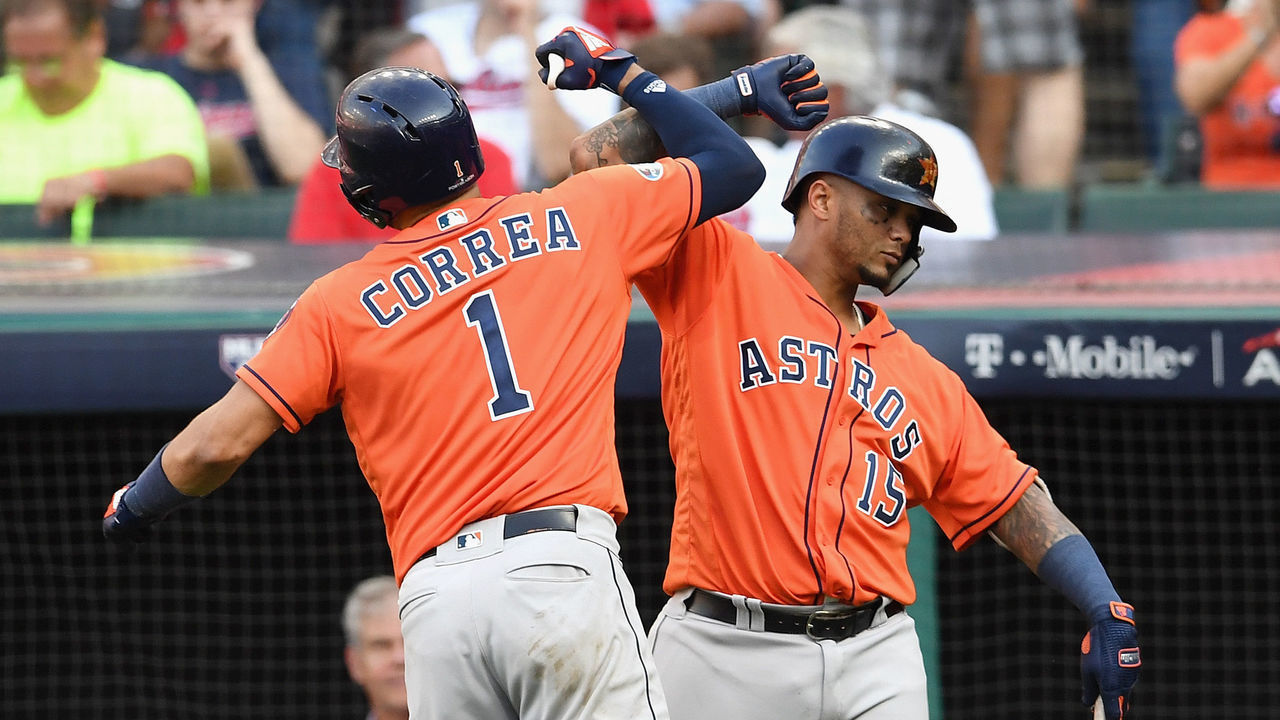 CLEVELAND, OH - OCTOBER 08: Carlos Correa #1 of the Houston Astros celebrates with Martin Maldonado #15 after hitting a three-run home run in the eighth inning against the Cleveland Indians during Game Three of the American League Division Series at Progressive Field on October 8, 2018 in Cleveland, Ohio.