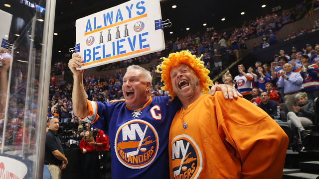 UNIONDALE, NEW YORK - SEPTEMBER 16: Fans celebrate a first period goal by Cal Clutterbuck #15 of the New York Islanders against the Philadelphia Flyers during a preseason game at the Nassau Veterans Memorial Coliseum on September 16, 2018 in Uniondale, New York.
