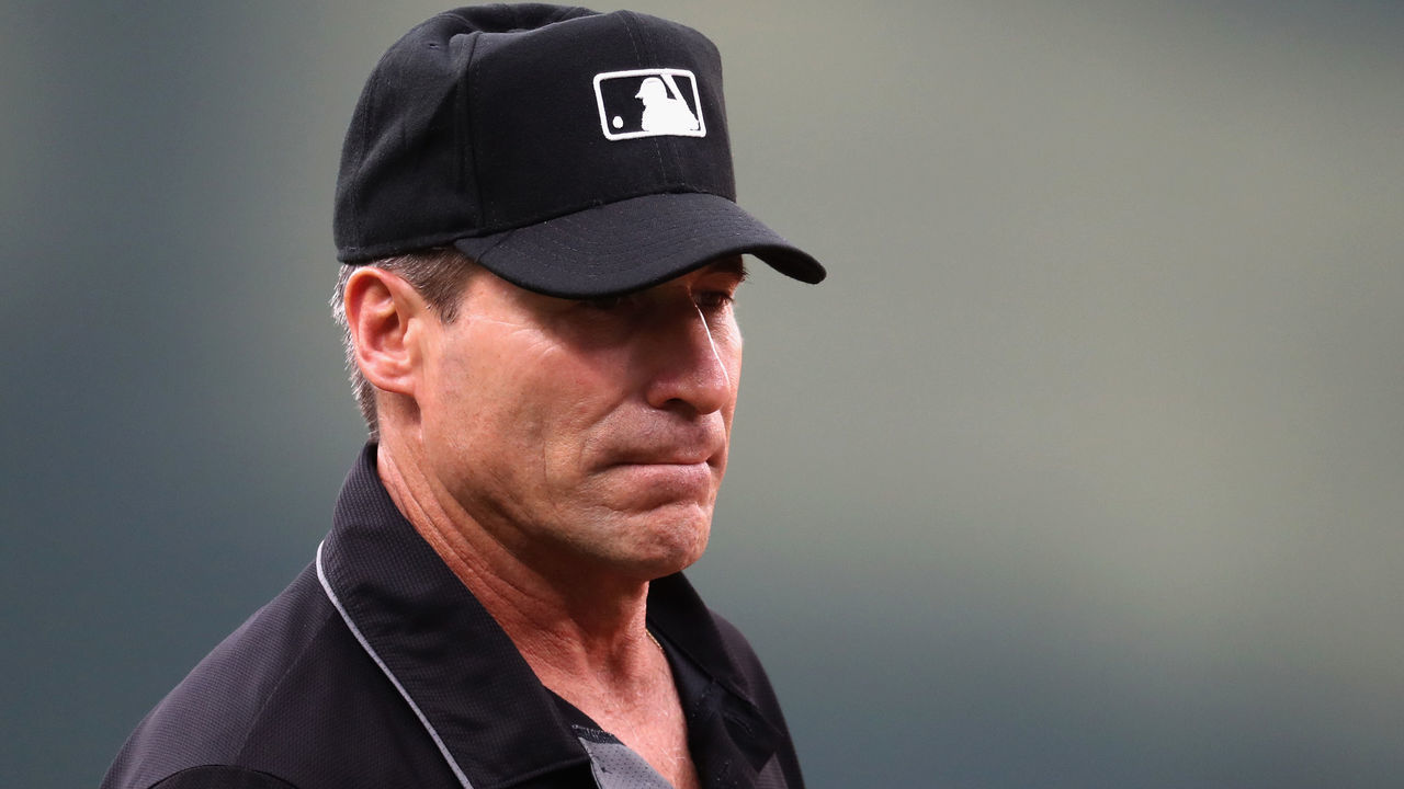 BALTIMORE, MD - AUGUST 02: Third base umpire Angel Hernandez #55 looks on in the first inning of the Baltimore Orioles and Kansas City Royals game at Oriole Park at Camden Yards on August 2, 2017 in Baltimore, Maryland.