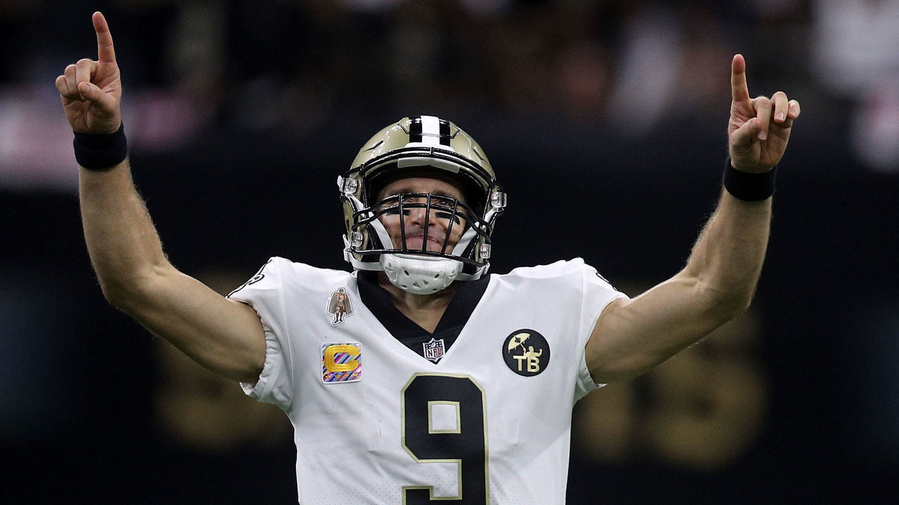 NEW ORLEANS, LA - OCTOBER 08: Drew Brees #9 of the New Orleans Saints reacts after throwing a 62 yard pass to take the all time yardage record against the Washington Redskins at Mercedes-Benz Superdome on October 8, 2018 in New Orleans, Louisiana.