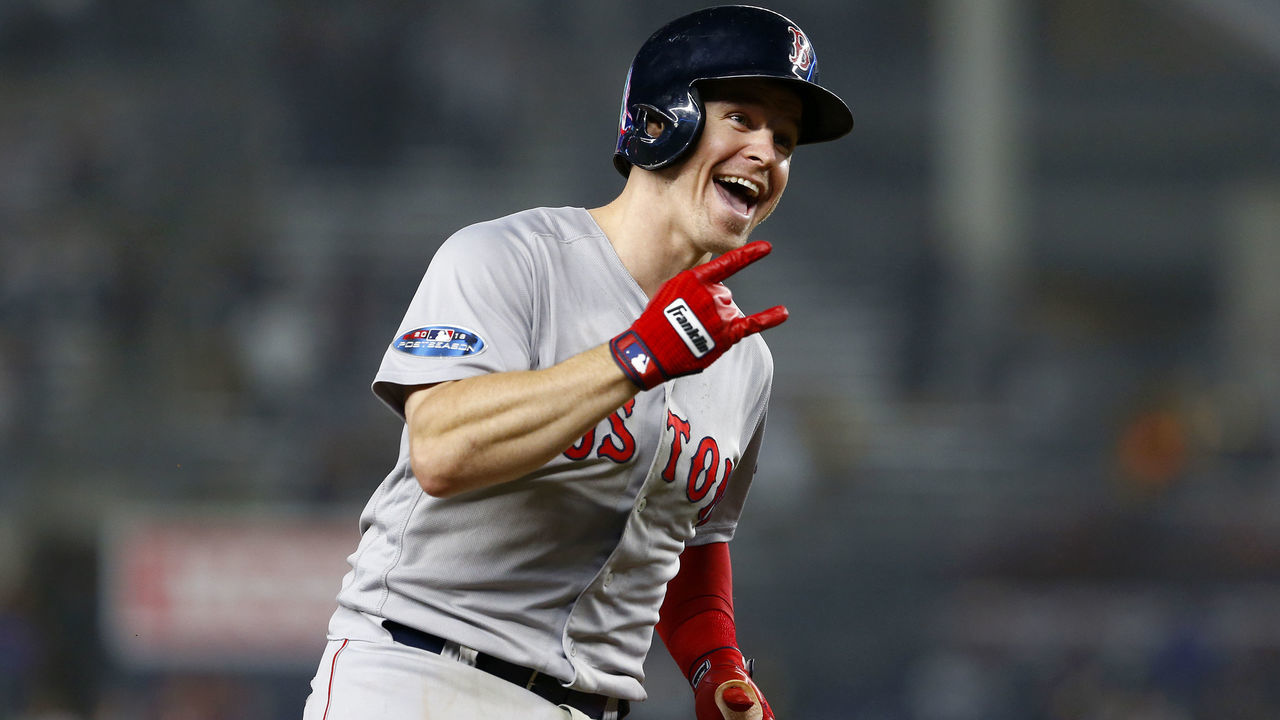 NEW YORK, NEW YORK - OCTOBER 08: Brock Holt #12 of the Boston Red Sox celebrates after hitting a two run home run against Austin Romine #28 of the New York Yankees during the ninth inning in Game Three of the American League Division Series at Yankee Stadium on October 08, 2018 in the Bronx borough of New York City.