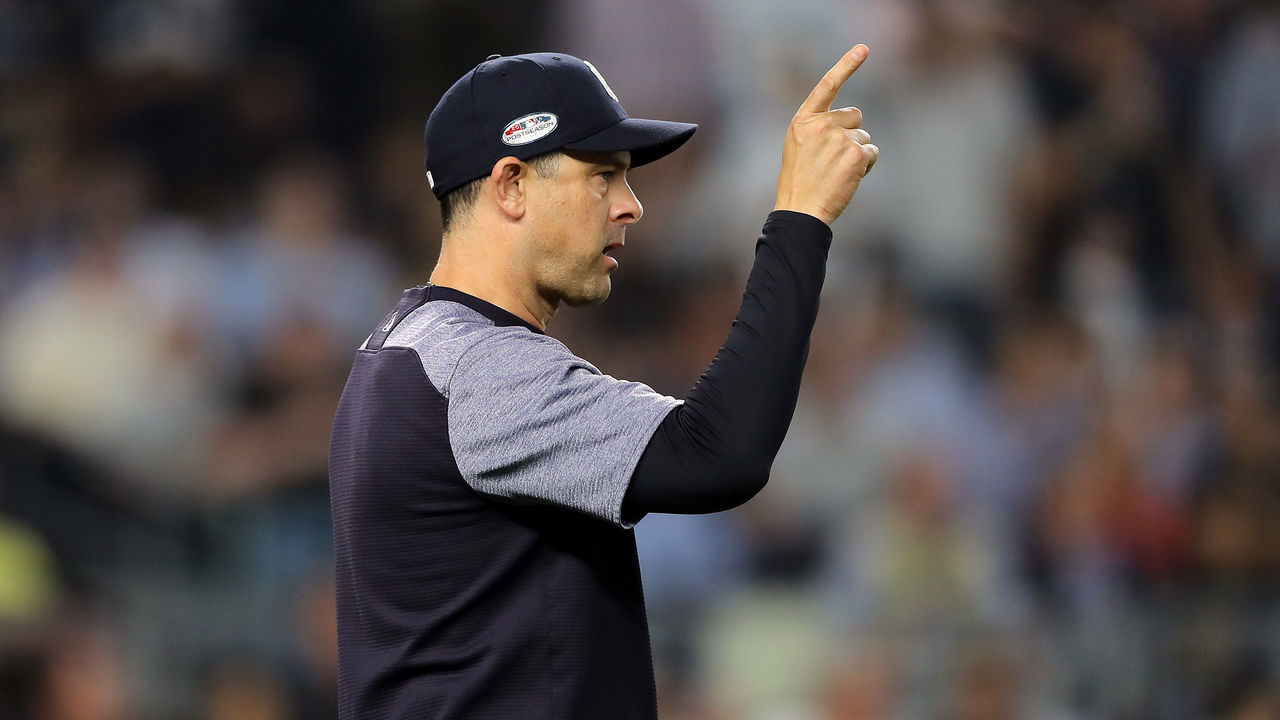 NEW YORK, NEW YORK - OCTOBER 09: Manager Aaron Boone #17 of the New York Yankees pulls David Robertson #30 in the seventh inning against the Boston Red Sox during Game Four American League Division Series at Yankee Stadium on October 09, 2018 in the Bronx borough of New York City.