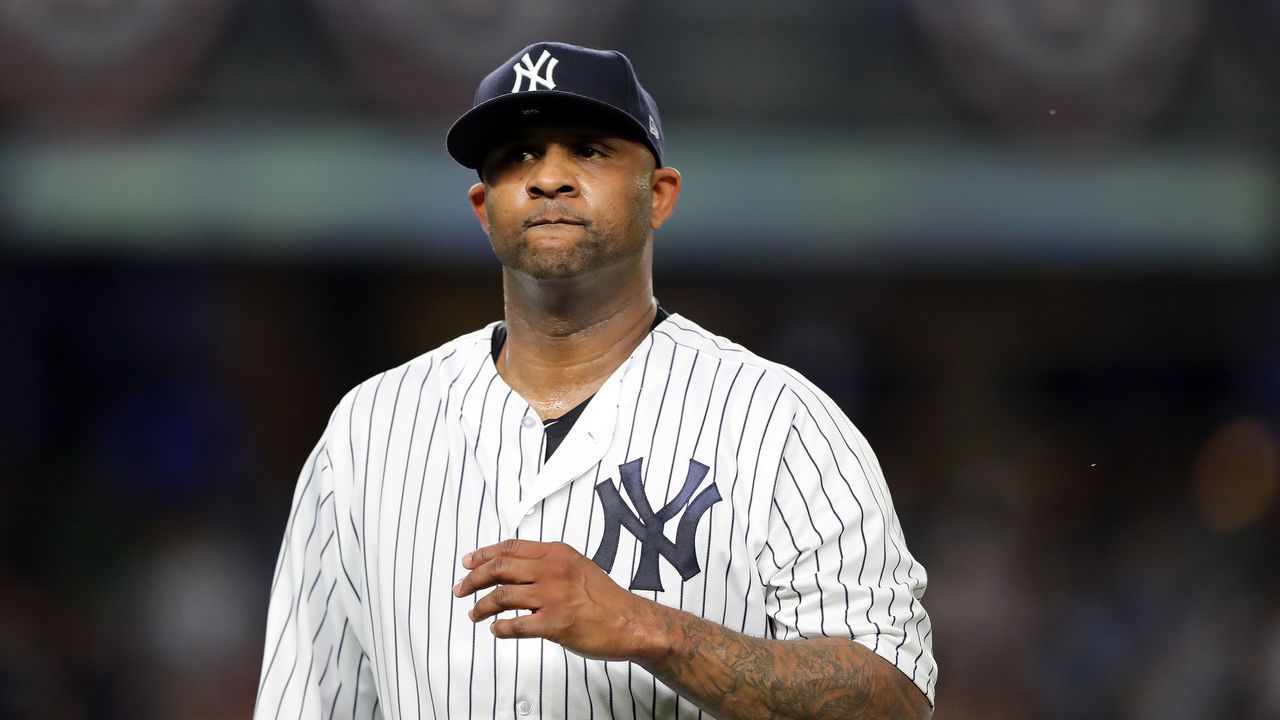 NEW YORK, NEW YORK - OCTOBER 09: CC Sabathia #52 of the New York Yankees walks back to the dugout after giving up three runs in the third inning against the Boston Red Sox during Game Four American League Division Series at Yankee Stadium on October 09, 2018 in the Bronx borough of New York City.
