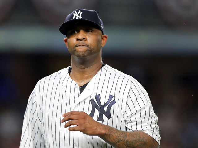 NEW YORK, NEW YORK - OCTOBER 09: CC Sabathia #52 of the New York Yankees walks back to the dugout after giving up three runs in the third inning against the Boston Red Sox during Game Four American League Division Series at Yankee Stadium on October 09, 2018 in the Bronx borough of New York City.
