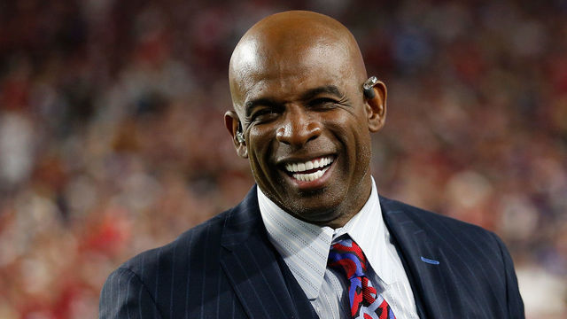 GLENDALE, AZ - DECEMBER 10: CBS analyst Deion Sanders on the sidelines during the NFL game between the Arizona Cardinals and the Minnesota Vikings at the University of Phoenix Stadium on December 10, 2015 in Glendale, Arizona.