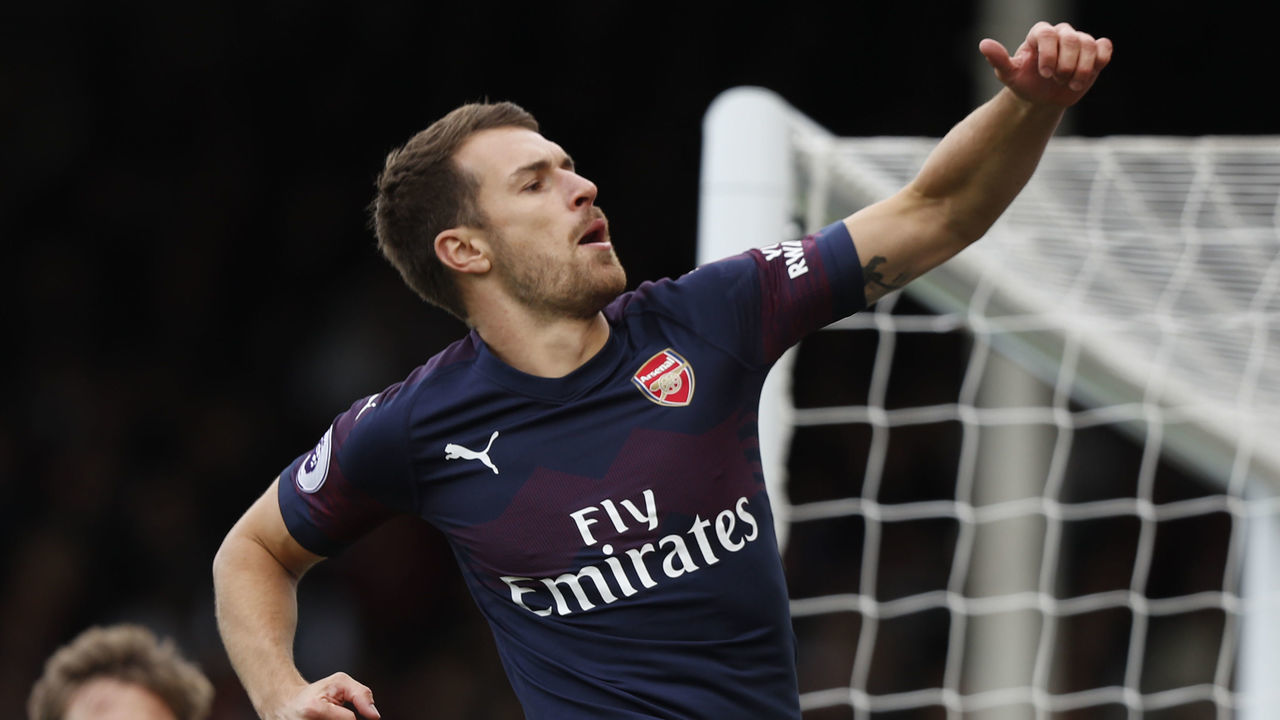 Arsenal's Welsh midfielder Aaron Ramsey celebrates after scoring the team's third goal during the English Premier League football match between Fulham and Arsenal at Craven Cottage in London on October 7, 2018.