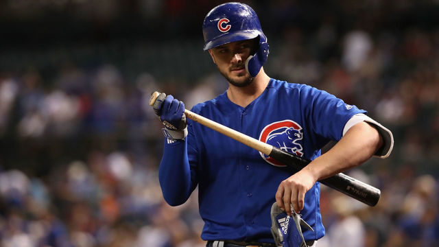 PHOENIX, AZ - SEPTEMBER 18: Kris Bryant #17 of the Chicago Cubs warms up on deck during the first inning of the MLB game against the Arizona Diamondbacks at Chase Field on September 18, 2018 in Phoenix, Arizona.