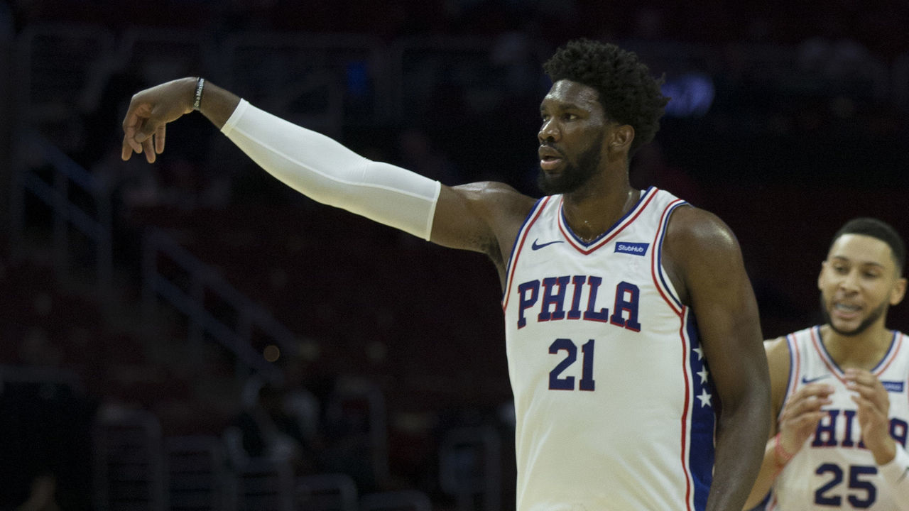 PHILADELPHIA, PA - SEPTEMBER 28: Joel Embiid #21 of the Philadelphia 76ers reacts after a made basket against Melbourne United in the preseason game at Wells Fargo Center on September 28, 2018 in Philadelphia, Pennsylvania.