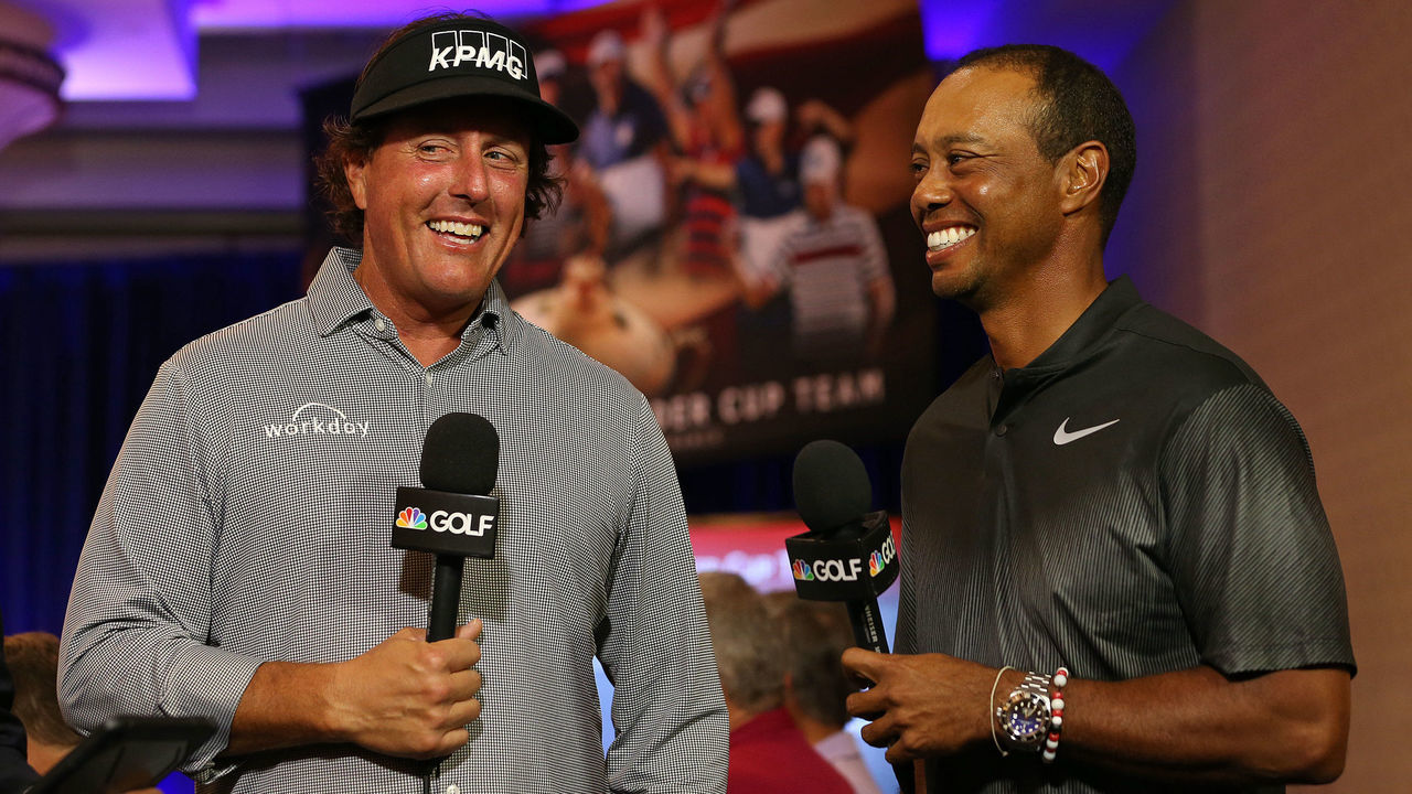 WEST CONSHOHOCKEN, PA - SEPTEMBER 04: Phil Mickelson and Tiger Woods are interviewed by the Golf Channel after being named as Captain's Picks along with Bryson DeChambeau by U.S. Ryder Cup Captain for the 2018 U.S. team during a press conference at the Philadelphia Marriott West on September 4, 2018 in West Conshohocken, Pennsylvania.
