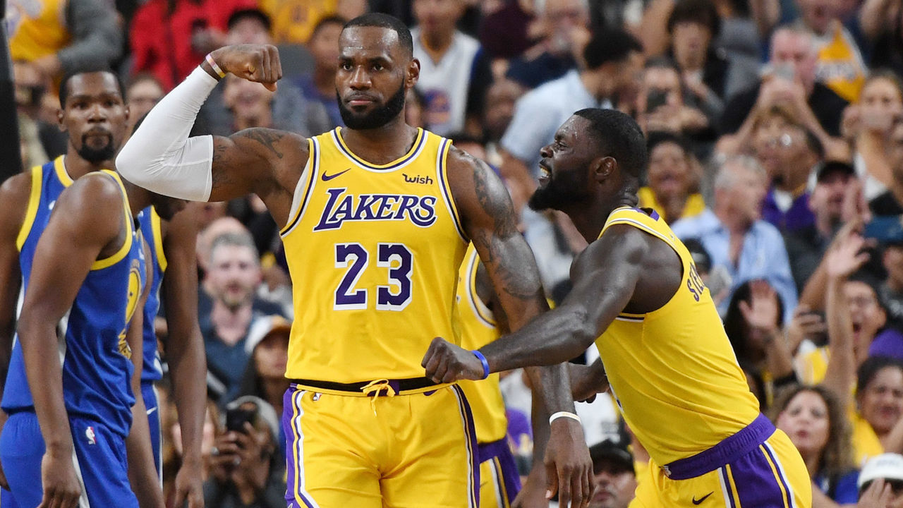 LAS VEGAS, NEVADA - OCTOBER 10: LeBron James #23 and Lance Stephenson #6 of the Los Angeles Lakers celebrate after James made a shot against the Golden State Warriors and was fouled during their preseason game at T-Mobile Arena on October 10, 2018 in Las Vegas, Nevada. The Lakers defeated the Warriors 123-113.