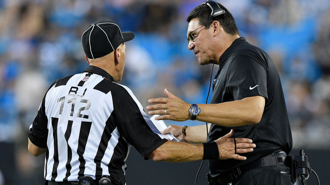 CHARLOTTE, NC - AUGUST 17: Head coach Ron Rivera of the Carolina Panthers talks to a referee in the second quarter against the Miami Dolphins during the game at Bank of America Stadium on August 17, 2018 in Charlotte, North Carolina.