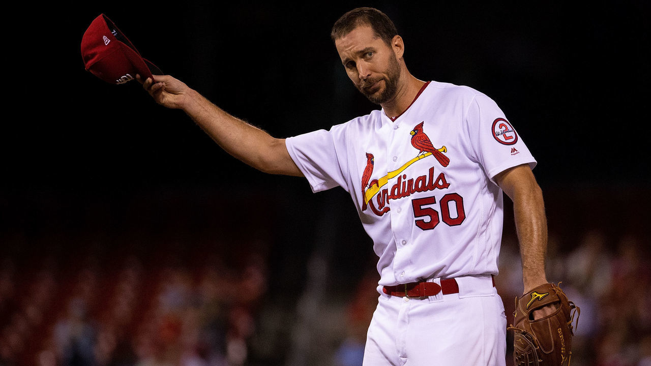 ST. LOUIS, MO - SEPTEMBER 10: Adam Wainwright #50 of the St. Louis Cardinals tips his cap after recording his 1,600th career strikeout while playing against the Pittsburgh Pirates in the second inning at Busch Stadium on September 10, 2018 in St. Louis, Missouri.