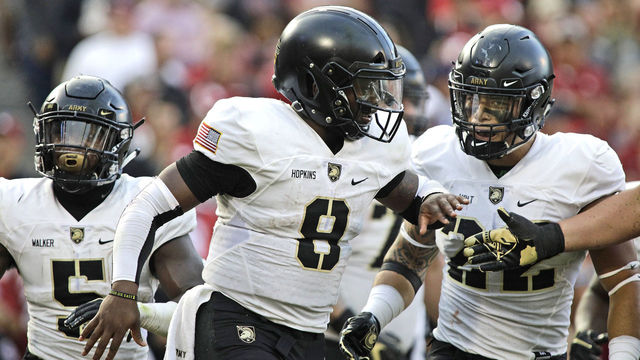 NORMAN, OK - SEPTEMBER 22: Quarterback Kelvin Hopkins Jr. #8 of the Army Black Knights celebrates a touchdown against the Oklahoma Sooners at Gaylord Family Oklahoma Memorial Stadium on September 22, 2018 in Norman, Oklahoma. The Sooners defeated the Black Knights 28-21 in overtime.