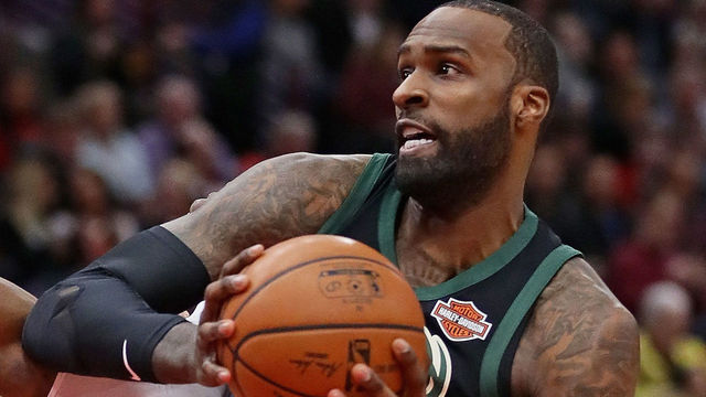CHICAGO, IL - MARCH 23: Shabazz Muhammad #15 of the Milwaukee Bucks drives against David Nwaba #11 of the Chicago Bulls at the United Center on March 23, 2018 in Chicago, Illinois.