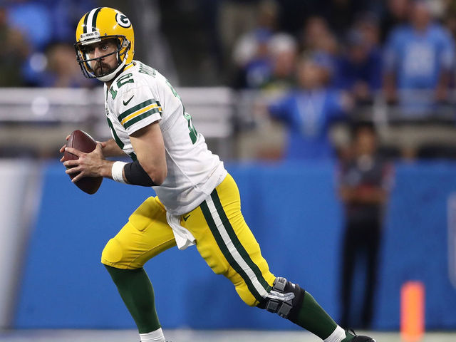 DETROIT, MI - OCTOBER 07: Aaron Rodgers #12 of the Green Bay Packers looks to throw a pass while playing the Detroit Lions at Ford Field on October 7, 2018 in Detroit, Michigan.