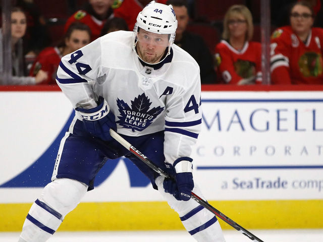 CHICAGO, IL - OCTOBER 07: Morgan Rielly #44 of the Toronto Maple Leafs shoots the game winning goal against the Chicago Blackhawks during the regular seasopn opening home game at the United Center on October 7, 2018 in Chicago, Illinois. The Maple Leafs defeated the Blackhawks 7-6 in overtime.