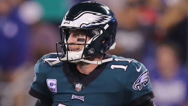 EAST RUTHERFORD, NJ - OCTOBER 11: Carson Wentz #11 of the Philadelphia Eagles celebrates his touchdown pass to teammate Zach Ertz in the second quarter against the New York Giants on October 11,2018 at MetLife Stadium in East Rutherford, New Jersey.