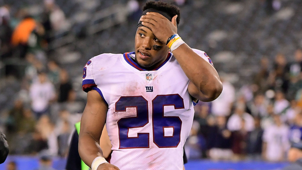 EAST RUTHERFORD, NJ - OCTOBER 11: Saquon Barkley #26 of the New York Giants reacts after his teams loss to the Philadelphia Eagles at MetLife Stadium on October 11, 2018 in East Rutherford, New Jersey. The Eagles defeated the Giants 34-13.