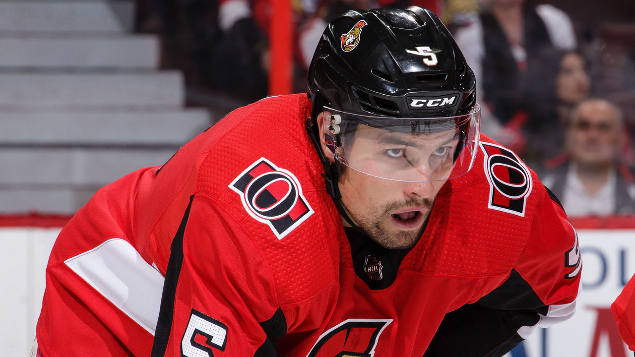 OTTAWA, ON - OCTOBER 4: Ottawa Senators' Cody Ceci #5 of the Ottawa Senators prepares for a faceoff against the Chicago Blackhawks at Canadian Tire Centre on October 4, 2018 in Ottawa, Ontario, Canada.