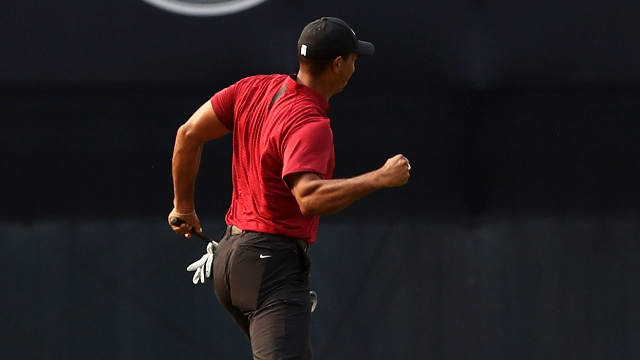 ST LOUIS, MO - AUGUST 12: Tiger Woods of the United States reacts after making a putt for birdie on the 18th green during the final round of the 2018 PGA Championship at Bellerive Country Club on August 12, 2018 in St Louis, Missouri.