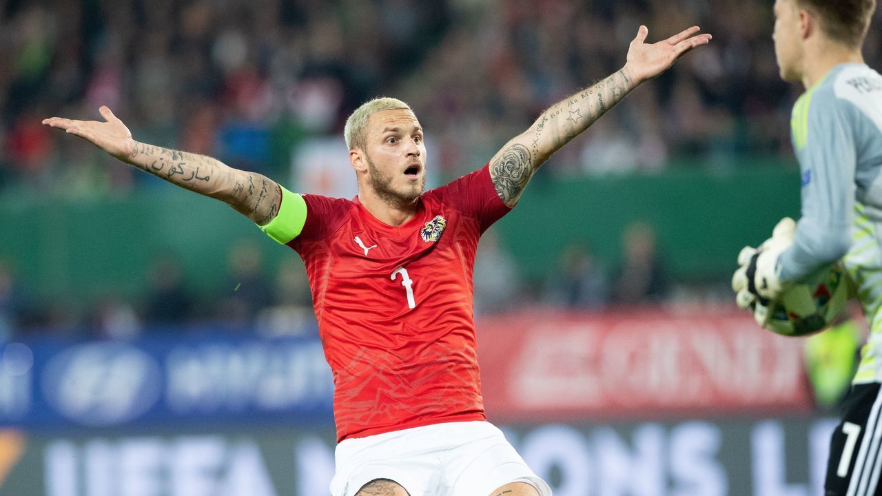 Austria's forward Marko Arnautovic (L) reacts in front of Northern Ireland's goalkeeper Bailey Peacock-Farrell during the UEFA Nations League Group B football match Austria v Northern Ireland at the Ernst Happel stadium in Vienna, Austria on October 12, 2018.