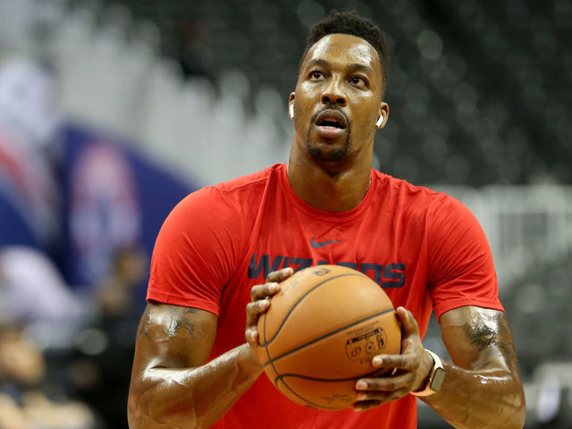 WASHINGTON, DC - OCTOBER 05: Dwight Howard of the Washington Wizards warm up prior to a preseason NBA game against the Miami Heat at Capital One Arena on October 5, 2018 in Washington, DC.