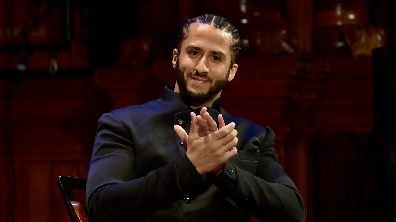 CAMBRIDGE, MA - OCTOBER 11: Colin Kaepernick on stage at the W.E.B. Du Bois Medal Award Ceremony at Harvard University on October 11, 2018 in Cambridge, Massachusetts. 2018 Honorees included Kehinde Wiley, Florence Ladd, Kenneth Chenault, Shirley Ann Jackson, Pamela Joyner, Bryan Stevenson, Dave Chappelle and Colin Kaepernick.