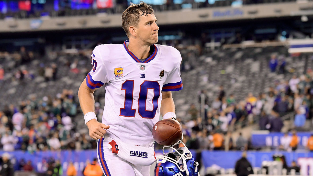 EAST RUTHERFORD, NJ - OCTOBER 11: Eli Manning #10 of the New York Giants walks off the field after his teams loss to the Philadelphia Eagles at MetLife Stadium on October 11, 2018 in East Rutherford, New Jersey. The Eagles defeated the Giants 34-13.
