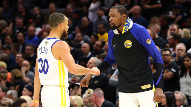 CLEVELAND, OH - JUNE 06: Kevin Durant #35 of the Golden State Warriors reacts with Stephen Curry #30 against the Cleveland Cavaliers in the second half during Game Three of the 2018 NBA Finals at Quicken Loans Arena on June 6, 2018 in Cleveland, Ohio.