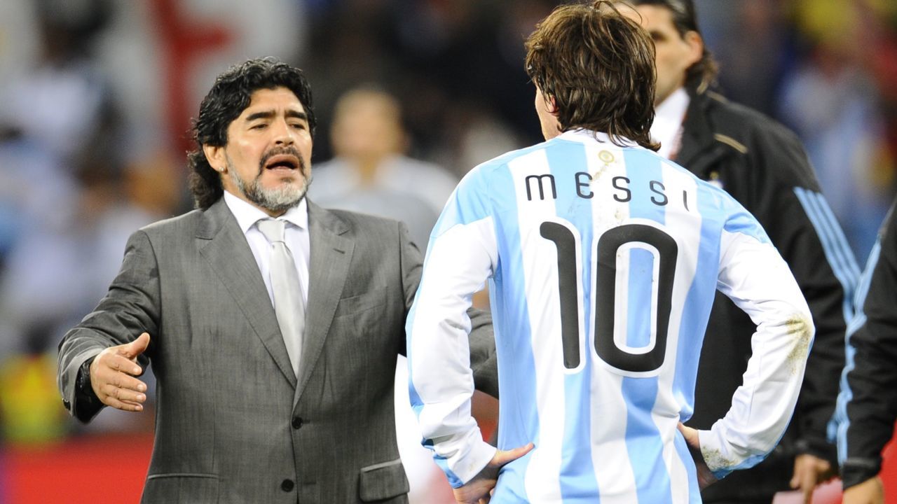 Argentina's coach Diego Maradona (L) looks dejected in front of Argentina's striker Lionel Messi after they lost the 2010 World Cup quarter-final football match Argentina vs. Germany on July 3, 2010 at Green Point stadium in Cape Town. Germany qualified for the semi-finals. NO PUSH TO MOBILE / MOBILE USE SOLELY WITHIN EDITORIAL ARTICLE - AFP PHOTO / DANIEL GARCIA