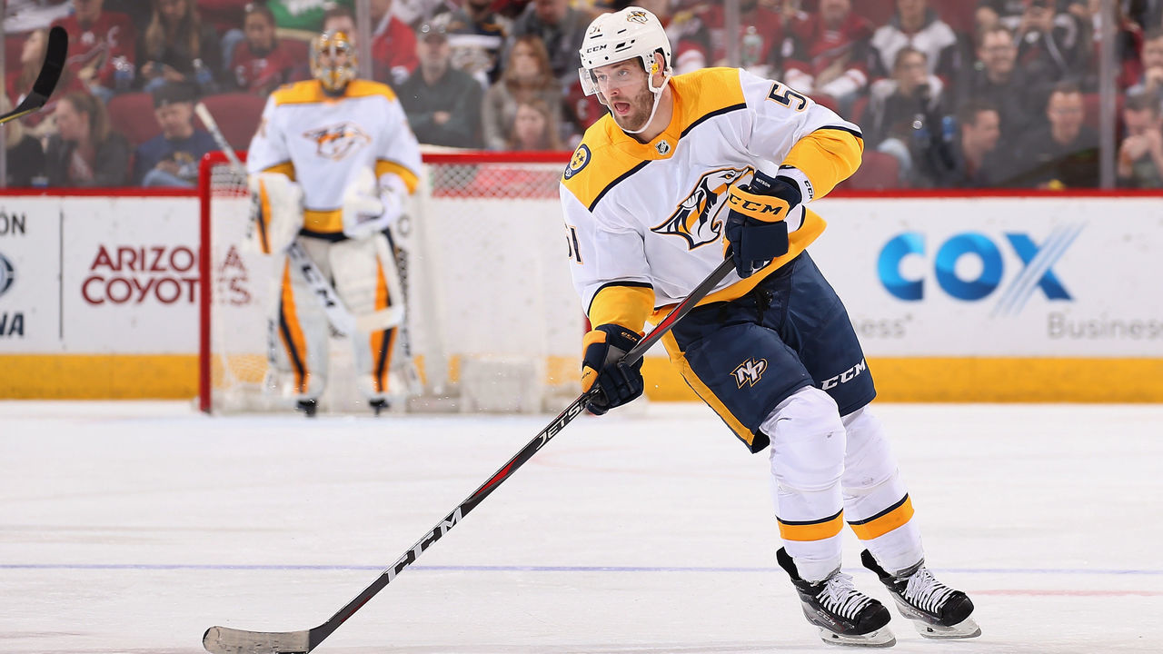 GLENDALE, AZ - JANUARY 04: Austin Watson #51 of the Nashville Predators skates with the puck during the NHL game against the Arizona Coyotes at Gila River Arena on January 4, 2018 in Glendale, Arizona. The Coyotes defeated the Predators 3-2 in overtime.