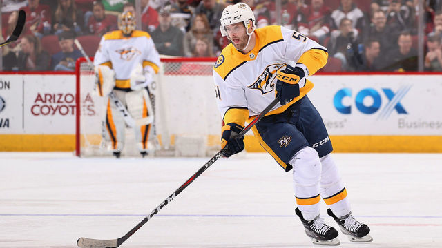 GLENDALE, AZ - JANUARY 04: Austin Watson #51 of the Nashville Predators skates with the puck during the NHL game against the Arizona Coyotes at Gila River Arena on January 4, 2018 in Glendale, Arizona. The Coyotes defeated the Predators 3-2 in overtime.