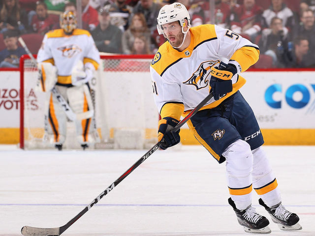GLENDALE, AZ - JANUARY 04: Austin Watson #51 of the Nashville Predators skates with the puck during the NHL game against the Arizona Coyotes at Gila River Arena on January 4, 2018 in Glendale, Arizona. The Coyotes defeated the Predators 3-2 in overtime.