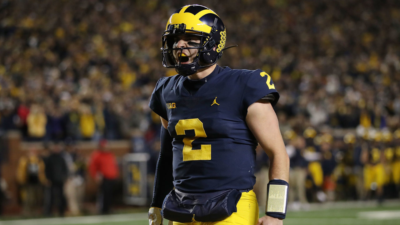 ANN ARBOR, MI - OCTOBER 13: Shea Patterson #2 of the Michigan Wolverines reacts to a a Karan Higdon #22 first half touchdown while playing the Wisconsin Badgers on October 13, 2018 at Michigan Stadium in Ann Arbor, Michigan.