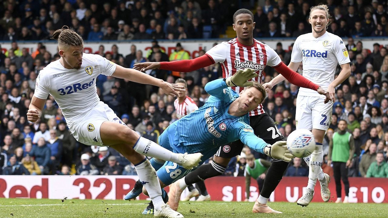 LEEDS, ENGLAND - OCTOBER 06: Kalvin Phillips of Leeds United hits the post under pressure from goalkeeper Luke Daniels of Brentford during the Sky Bet Championship match between Leeds United and Brentford at Elland Road on October 6, 2018 in Leeds, England.